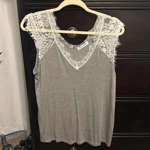 Francesca’s t-shirt with lace sleeves, size M